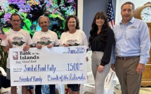 (l-r): Allen Dunham, Road Rally Founder Randy Carson, and Karen Shutway with Bank of the Islands’ Kelsey Hamilton and David Lowden.